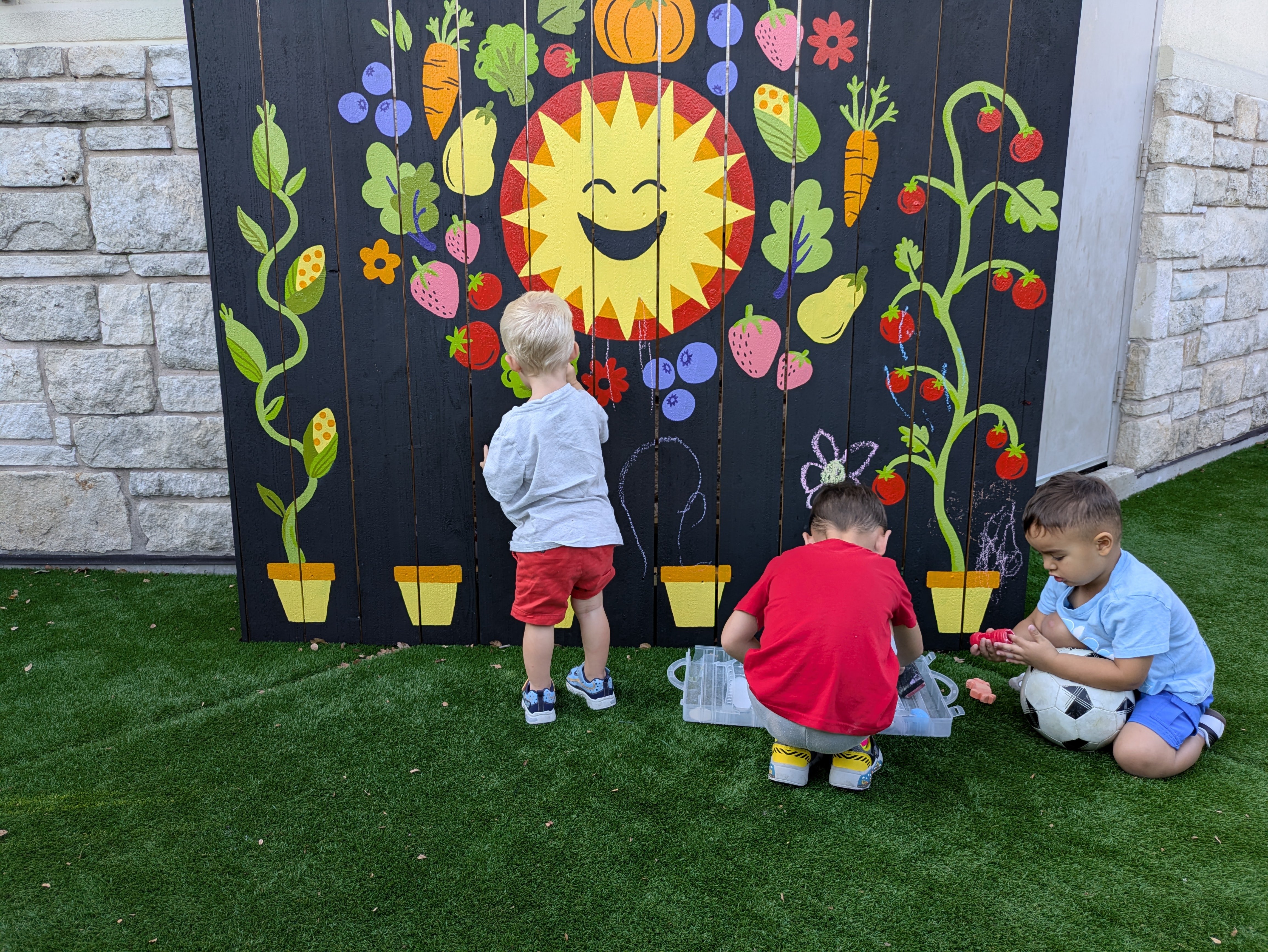 Mural chalk play with Sam, Auggie, Arthur